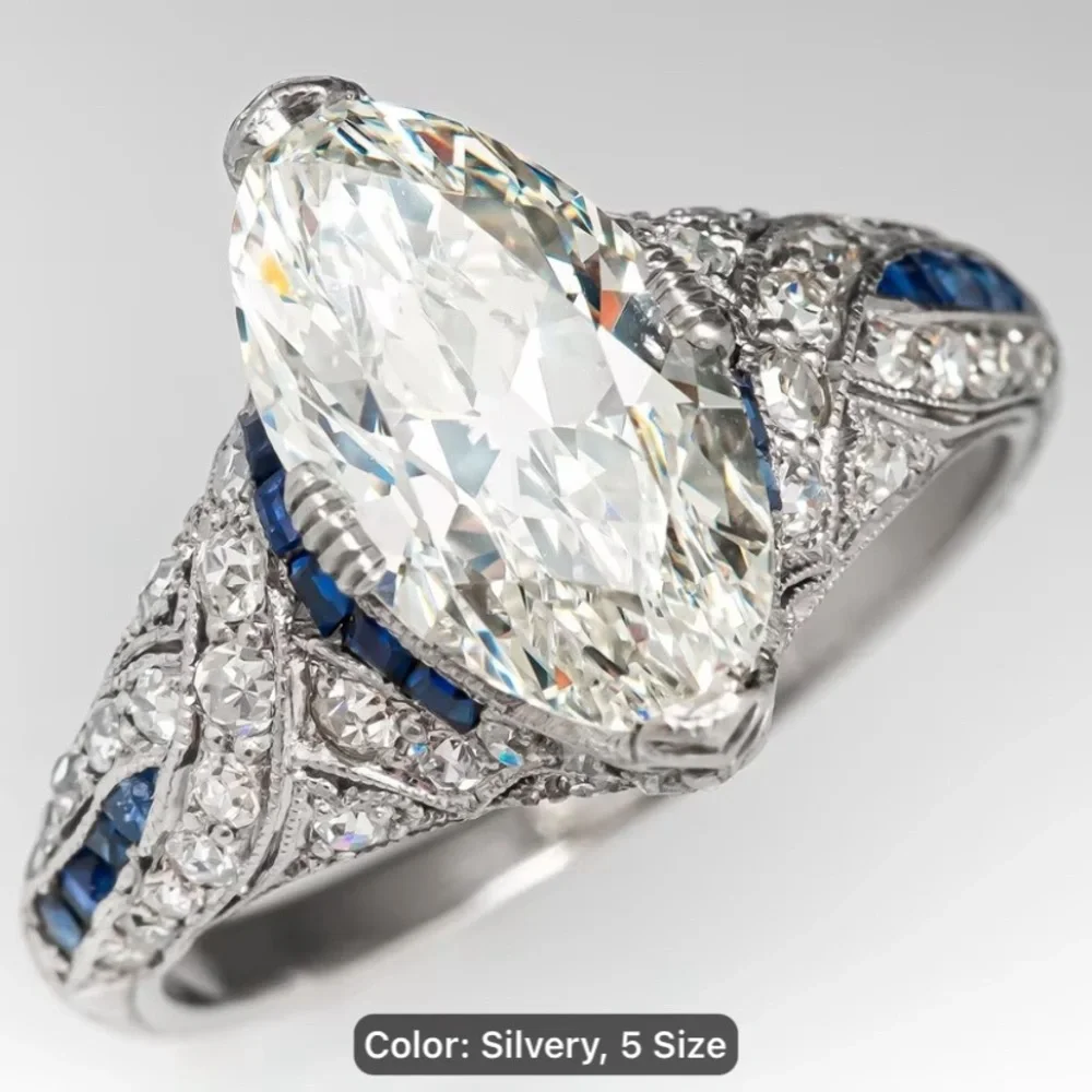 9.25 Sterling Silver Marquise Moissanite Ring with Blue Sapphire Accents - Picture 2 of 4